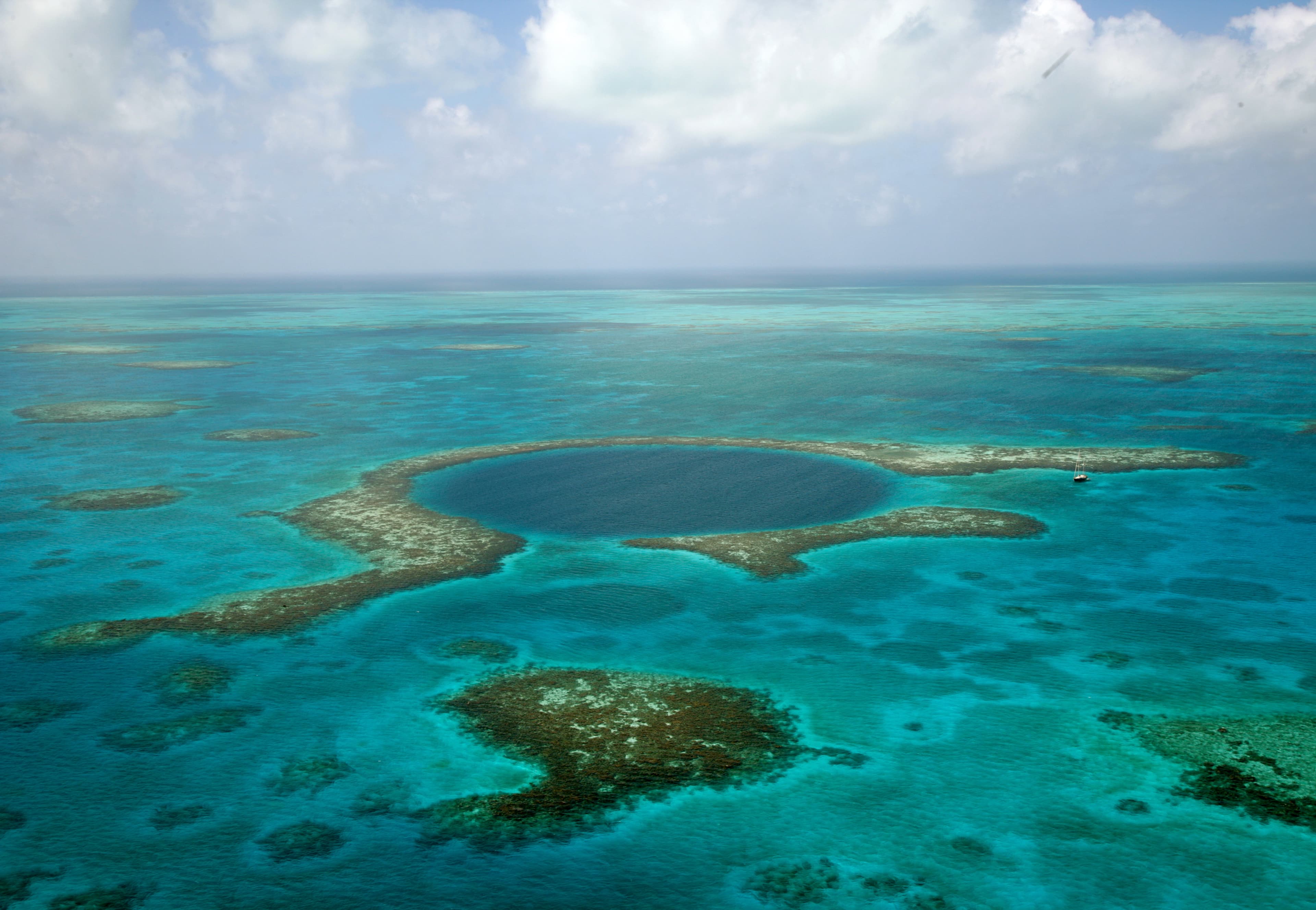 The Great Blue Hole, a giant marine sinkhole off the coast of Belize
